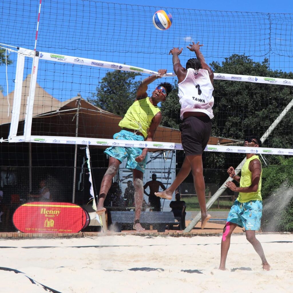 Beach Volleyball Players playing beach volleyball.